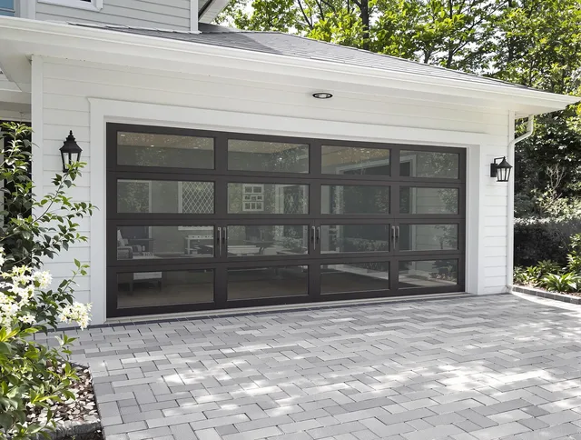 Coconut Creek Garage Door Repair design specialist presenting custom garage door options to Coconut Creek homeowner
