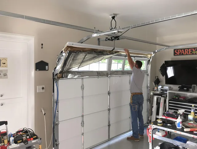 Garage door section replacement by Coconut Creek Garage Door Repair in Coconut Creek